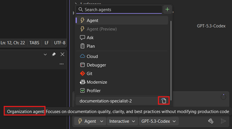 Agent picker dropdown showing organization-level custom agents with descriptions and definition buttons